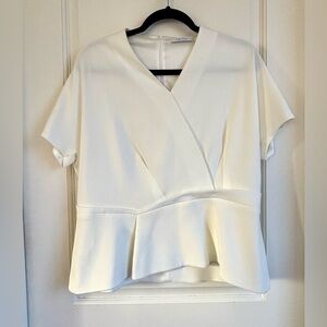 The Fold Structured Peplum Top